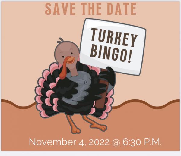Turkey with a sign that says turkey bingo